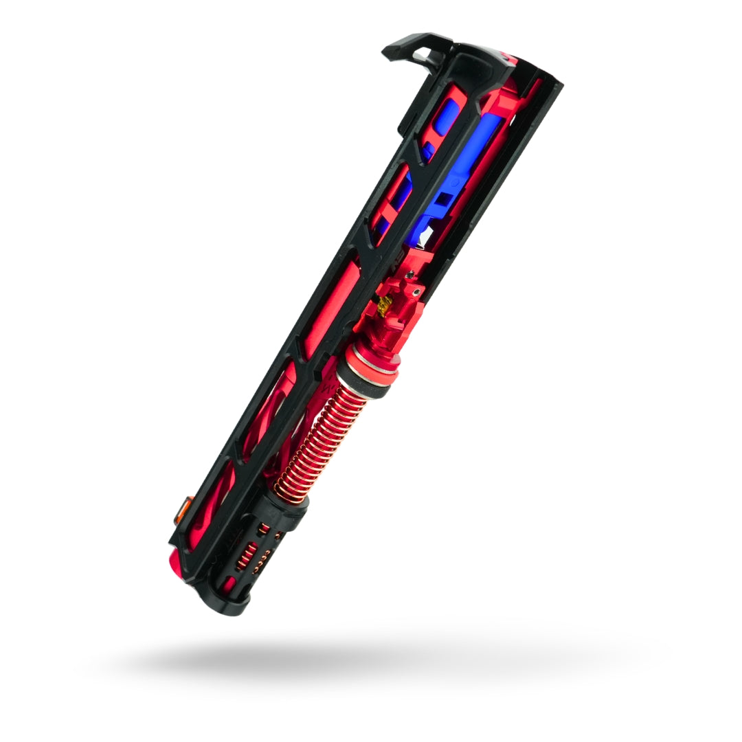 Black and red custom airsoft hi capa pistol slide assembly with red and black coloring, featuring a fiber optic front sight, and various upgraded custom tokyo marui components. EDGE upgraded nozzle and TDC nexxspeed hicapa hop up unit.