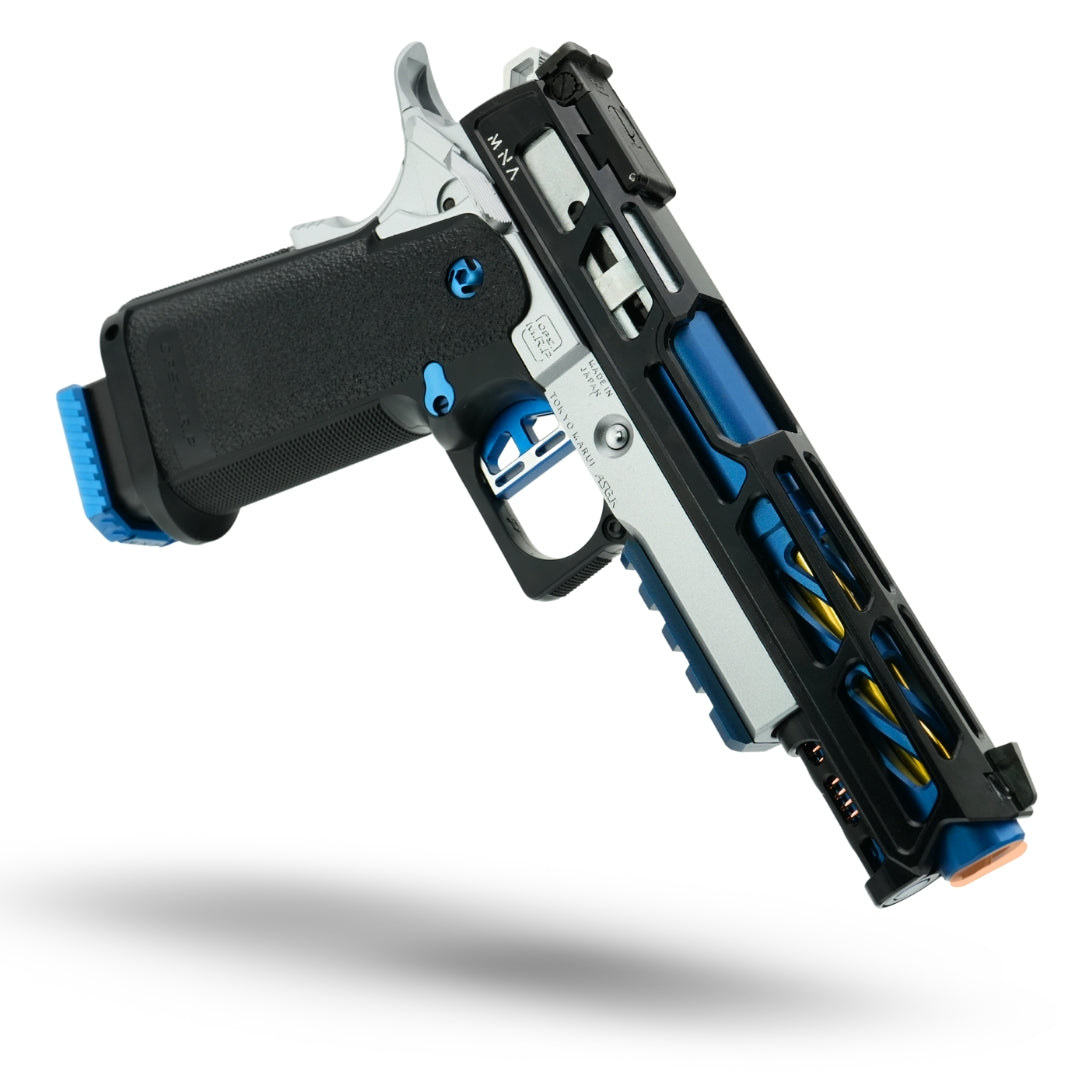 Premium custom-built Tokyo Marui Hi-Capa gas blowback airsoft pistol featuring anodized blue, matte black, and polished silver accents, upgraded recoil spring, match-grade inner barrel, and competition-ready trigger system.