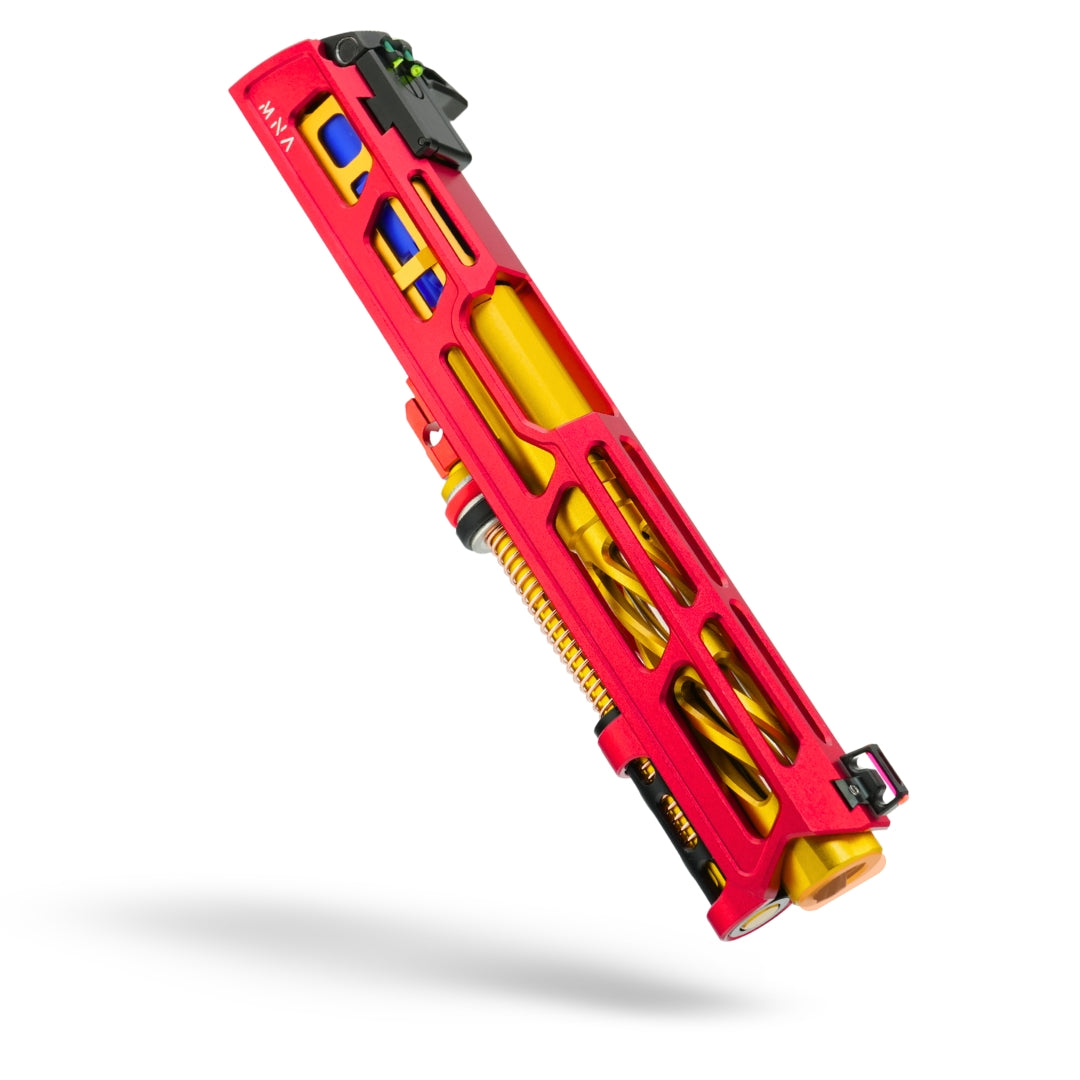 Red and gold custom airsoft hi capa pistol slide assembly with red and gold coloring, featuring a fiber optic front sight, and various upgraded custom tokyo marui components.