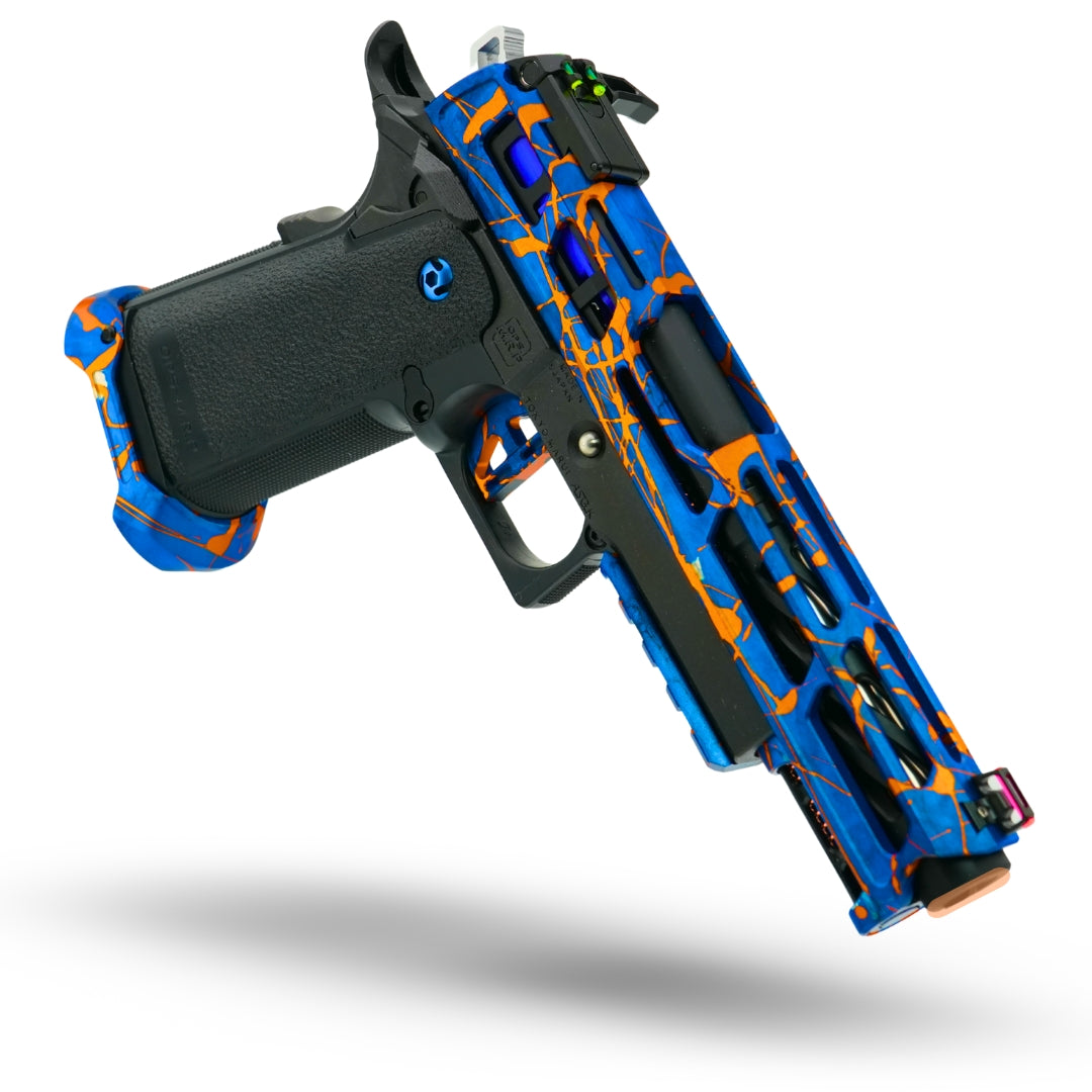 MNA Minnesota Airsoft custom anodized Hi-Capa 5.1 airsoft gas pistol featuring blue, green, and gold splatter design, CNC-machined slide, upgraded hop-up, enhanced recoil spring, precision barrel, and pre-built premium competition setup.