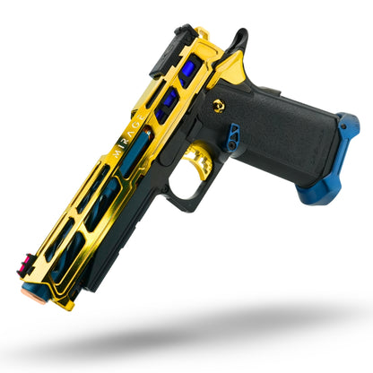 Custom navy blue and glossy gold Tokyo Marui Hi-Capa 5.1 Gold Match airsoft pistol featuring MNA Mirage CNC aluminum slide (Glossy Gold), MNA Torque skeletonized outer barrel (midnight blue), and MNA CNC magwell (navy); equipped with Tokyo Marui fiber optic front sight and NexxSpeed V2 CNC TDC hop-up unit (gold).