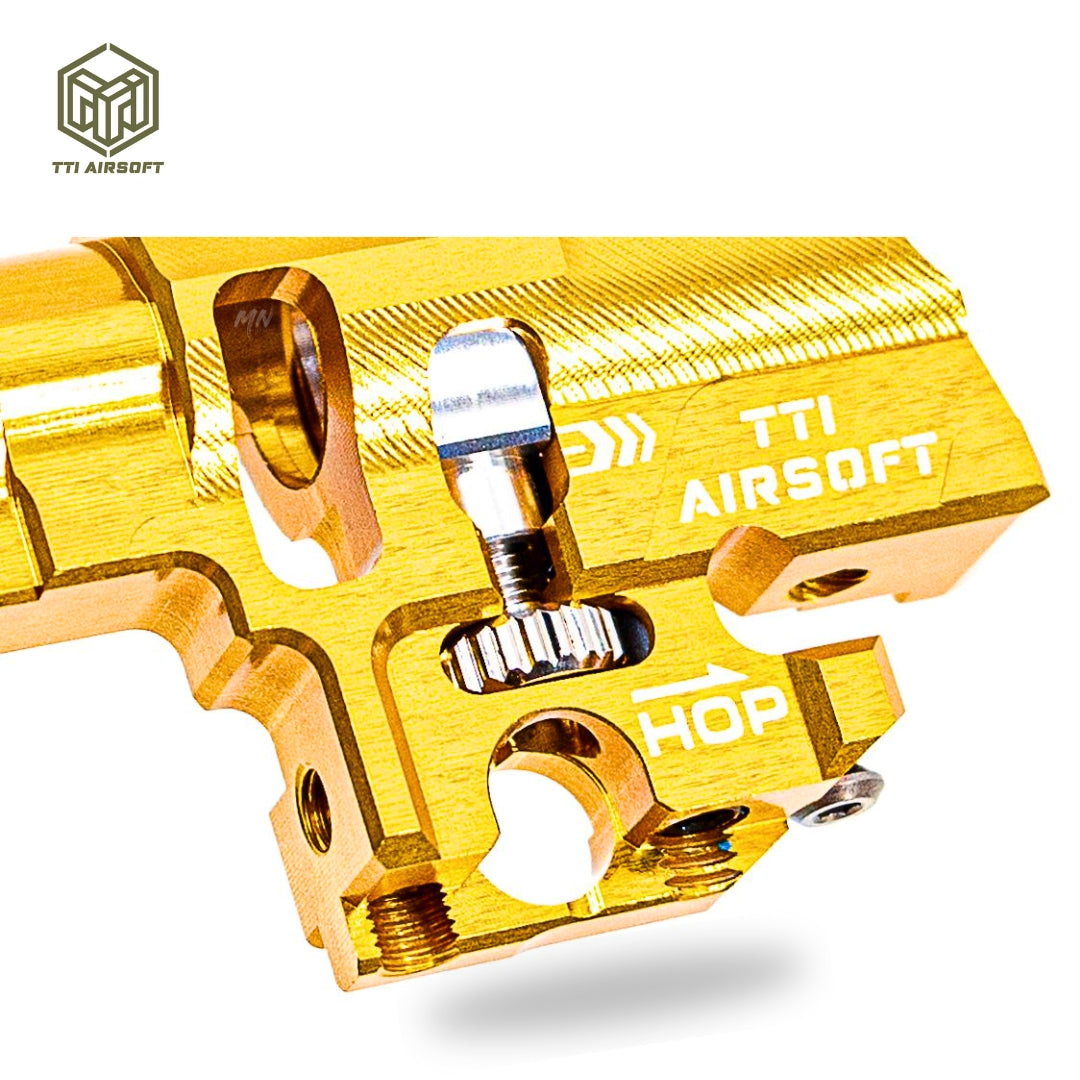 TTI Infinity CNC TDC Hop Up Unit for airsoft Hi Capa pistols. Engineered with precision in CNC 7075 aluminum, its True TDC design provides superior accuracy for Tokyo Marui Hi-CAPA spec guns. Gold Close up color