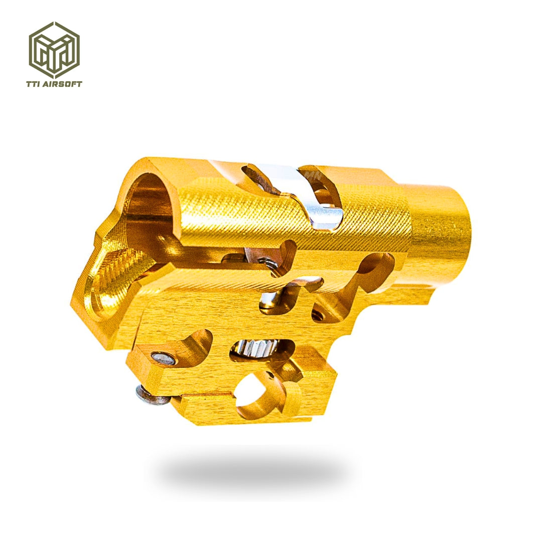 Upgrade your Hi Capa airsoft build with the TTI Infinity CNC TDC Hop Up Unit. Its CNC 7075 aluminum construction and True TDC design enhance accuracy and durability for Tokyo Marui pistols. Gold color