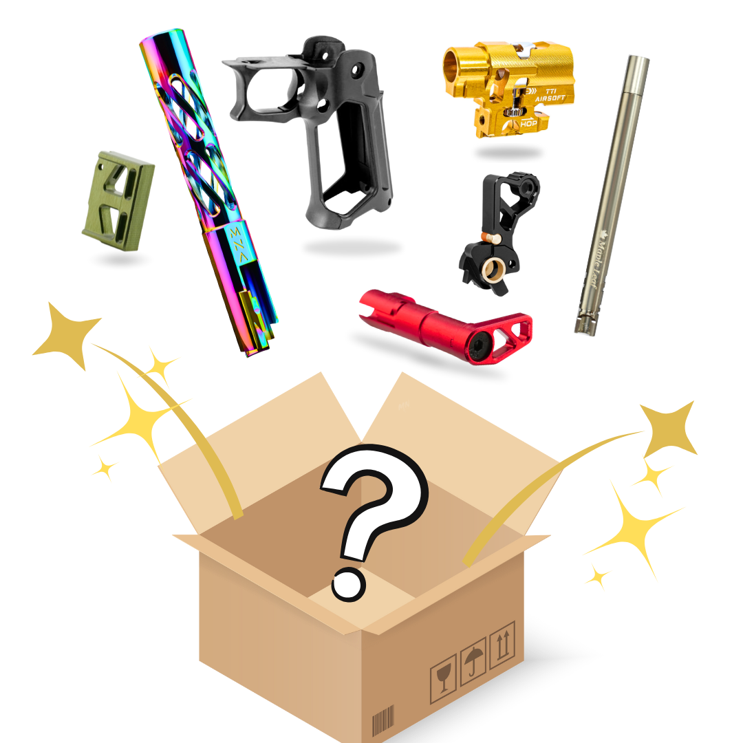 airsoft hi capa tokyo marui mystery box with random hicapa upgrades like outer barrels, triggers, hop up units, inner barrels, grips, and skeletonized items like CNC upgraded slides.